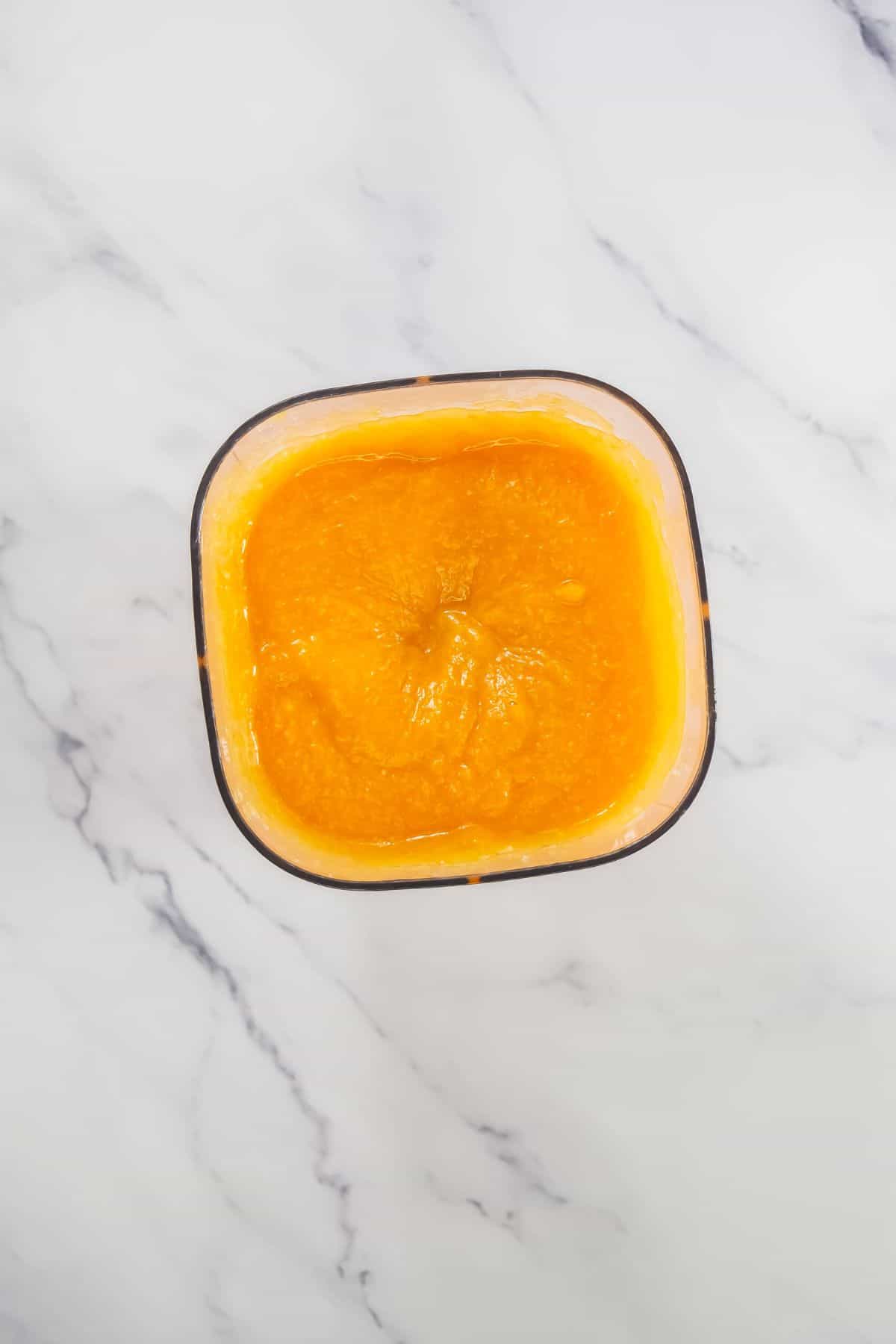 Smooth orange puree of the vegetables, ready to mix into the cheese sauce.