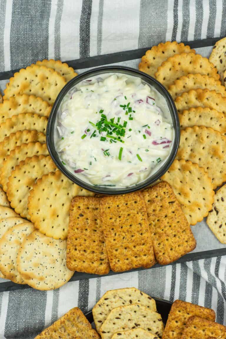 Jarlsberg cheese dip on a tray of crackers