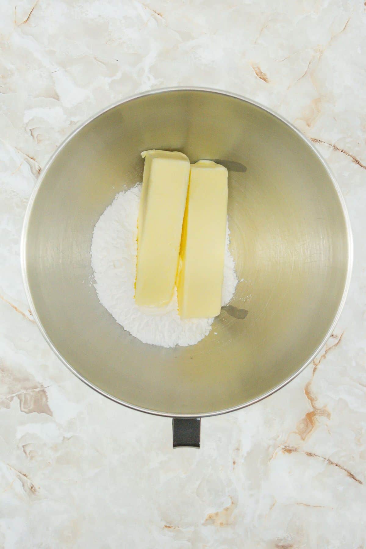 Meltaway Cookies first ingredients mixture, butter and powdered sugar