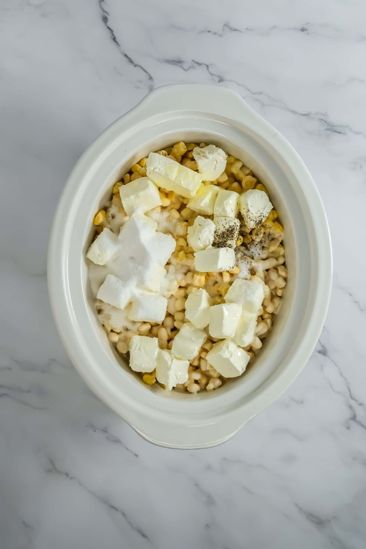 Butter, seasoning, and additional cream mix in.