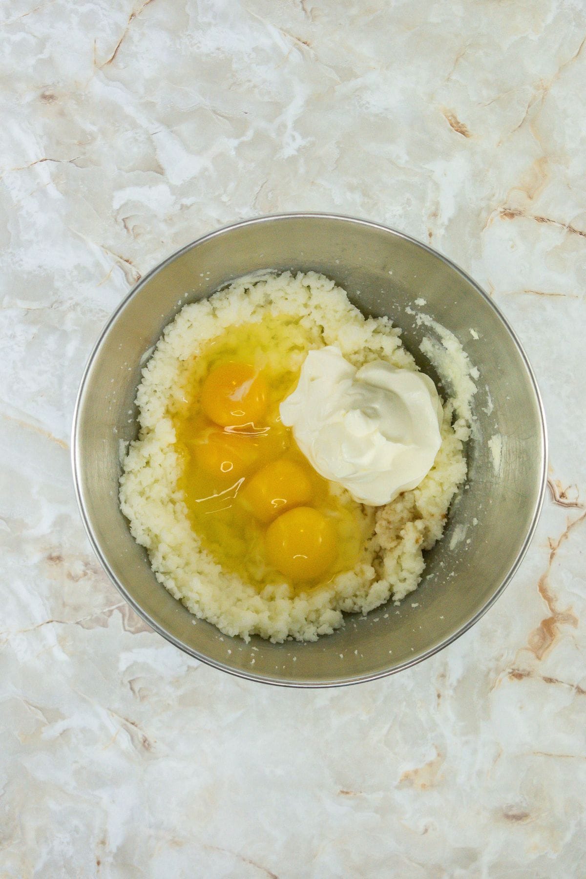 Sour Cream Cookies ingredients mixture with the eggs, and sour cream
