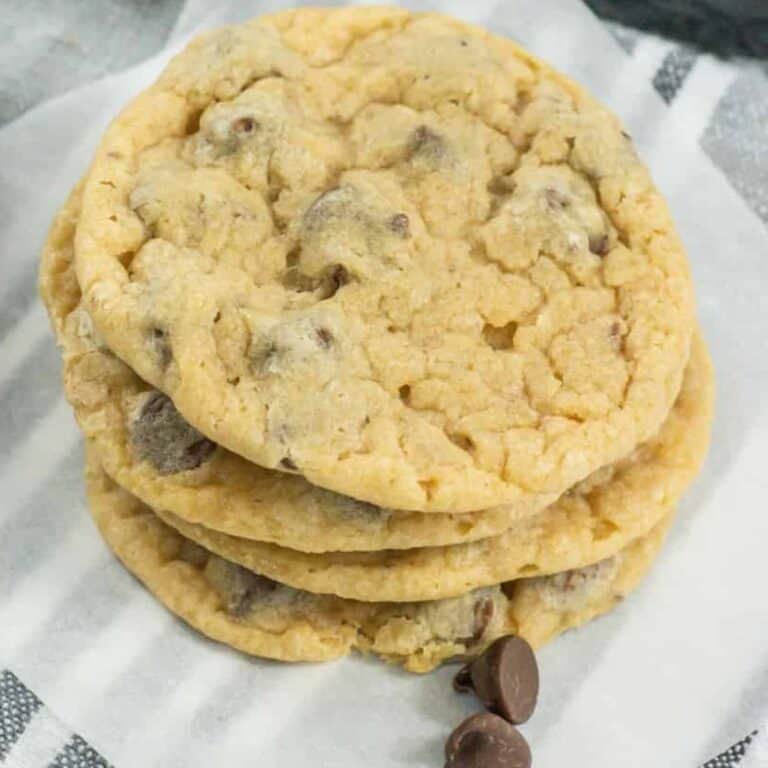 bisquick cookies 4 stacked on top of each other on a square of parchment paper