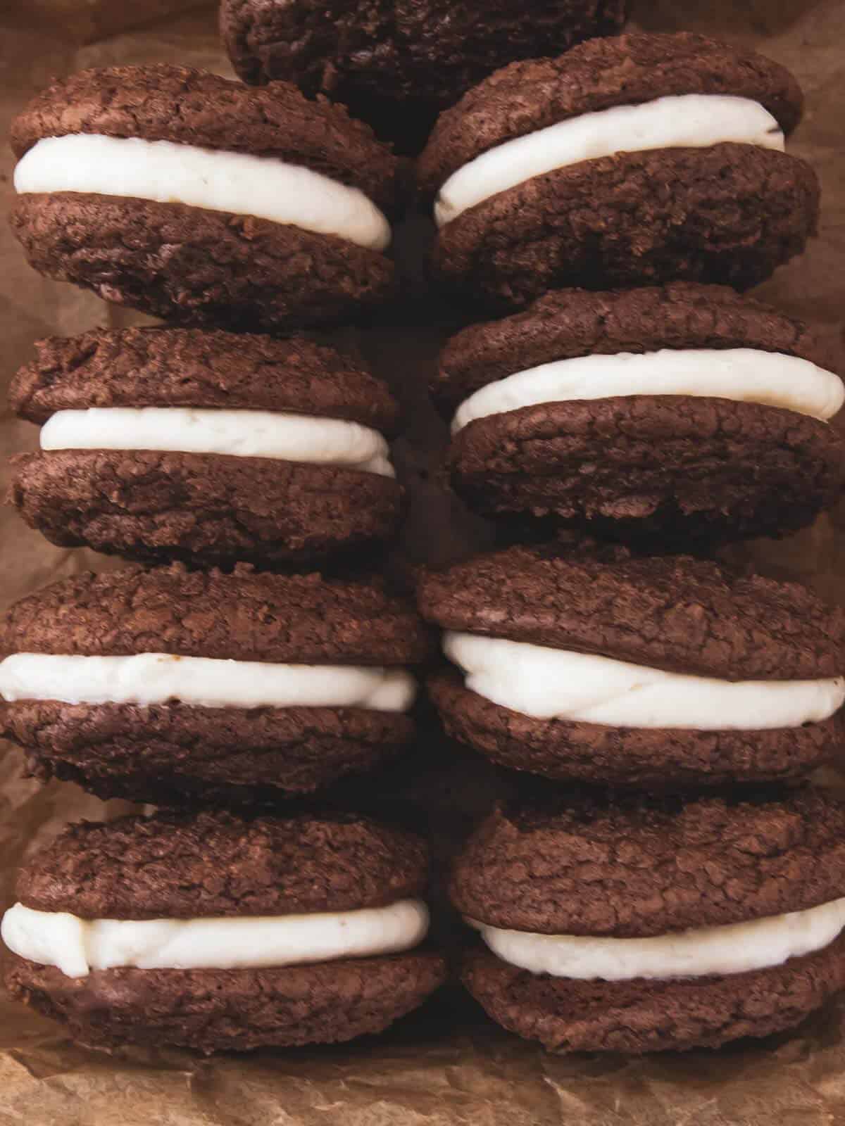 Whoopie pie cookie sandwiches stacked in two rows