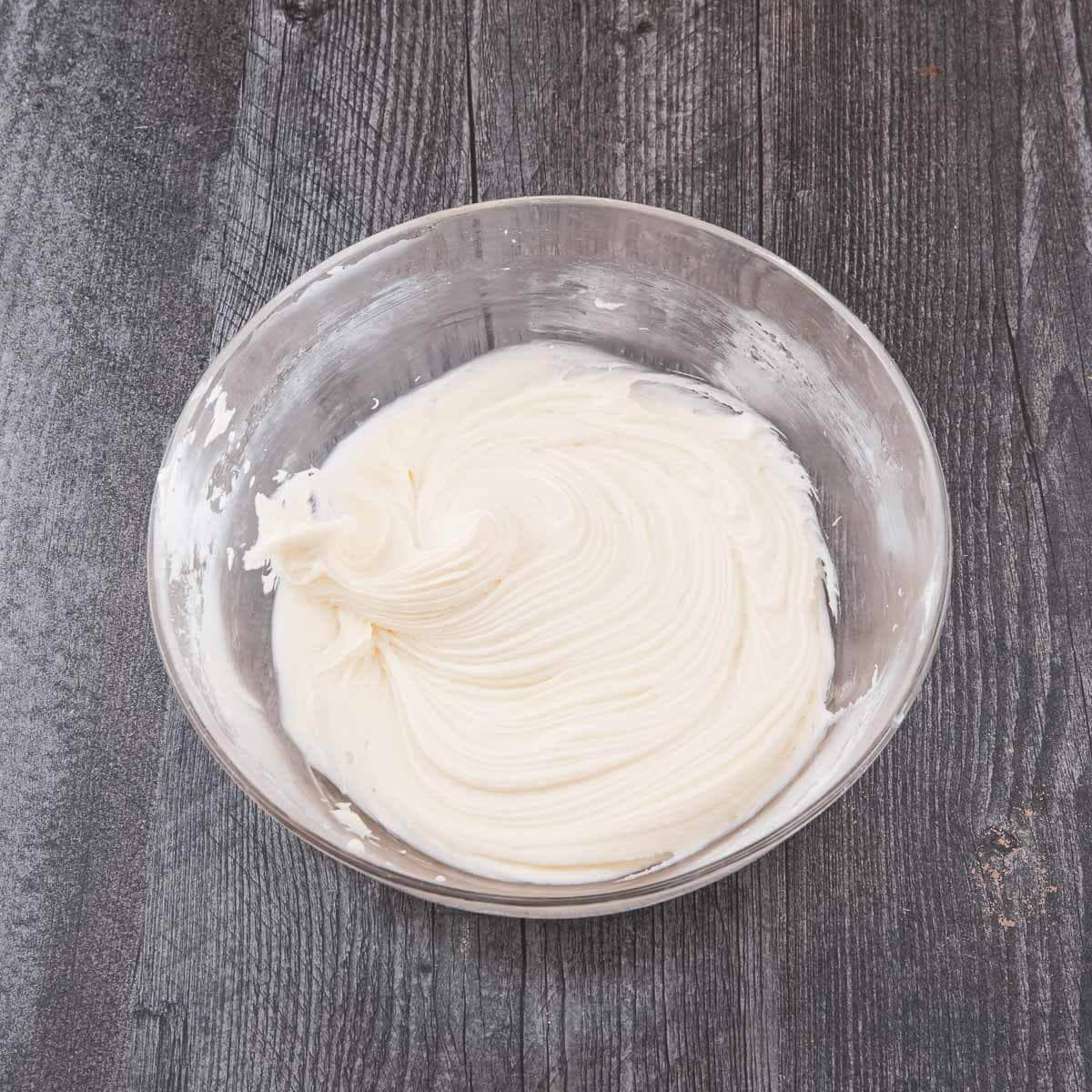 The mixture is whipped into a smooth, fluffy filling.