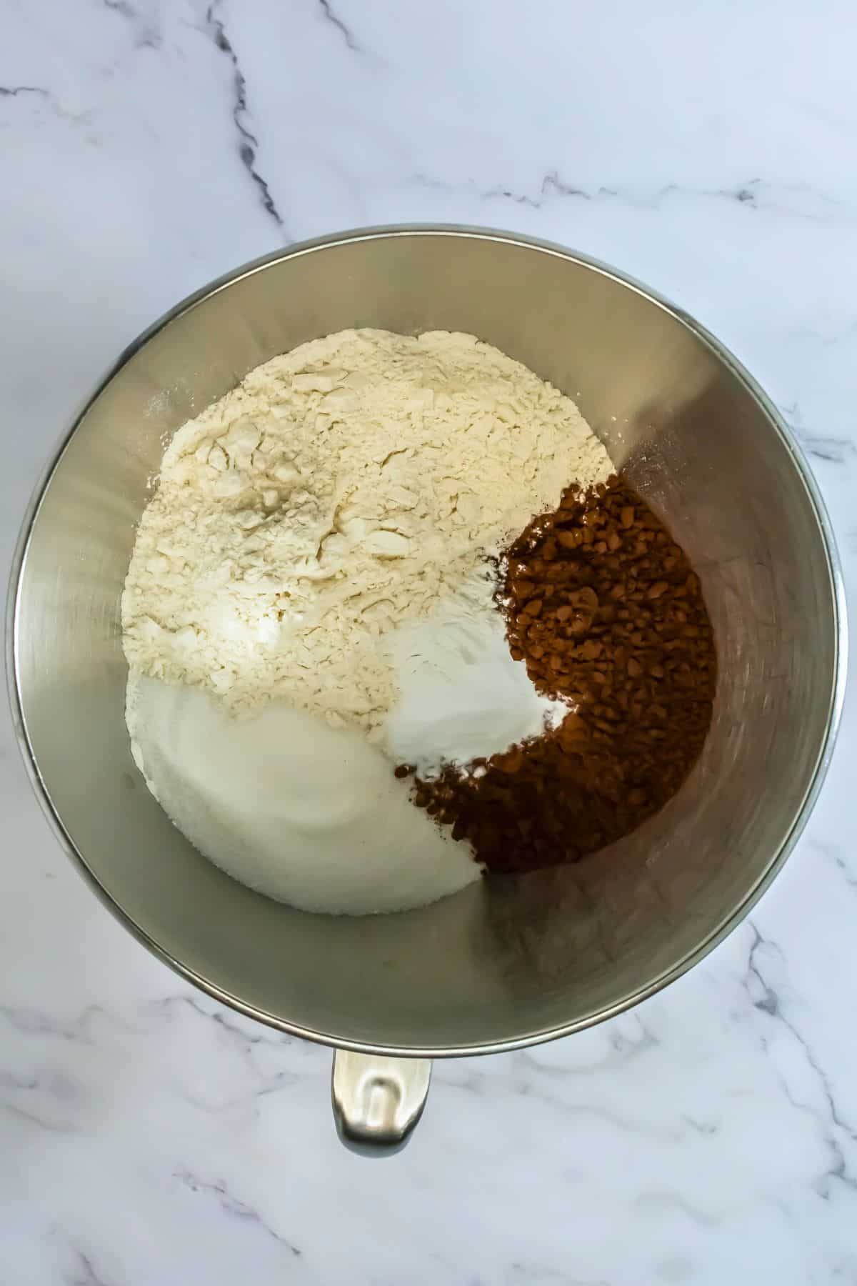 stand mixer bowl with the dry ingredients for mini chocolate cupcake batter