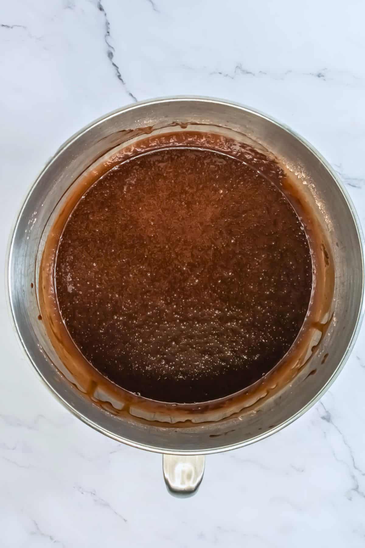 stand mixer bowl showing constancy of fully mixed chocolate cupcake batter