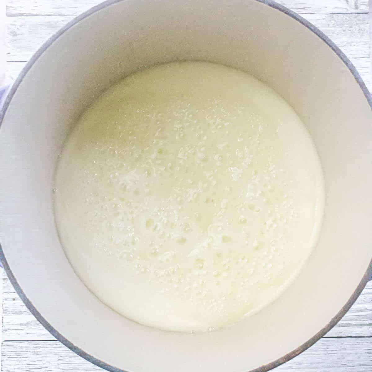 Butterscotch chips and oats are mixed into the melted sugar base, getting ready to form the cookies.
