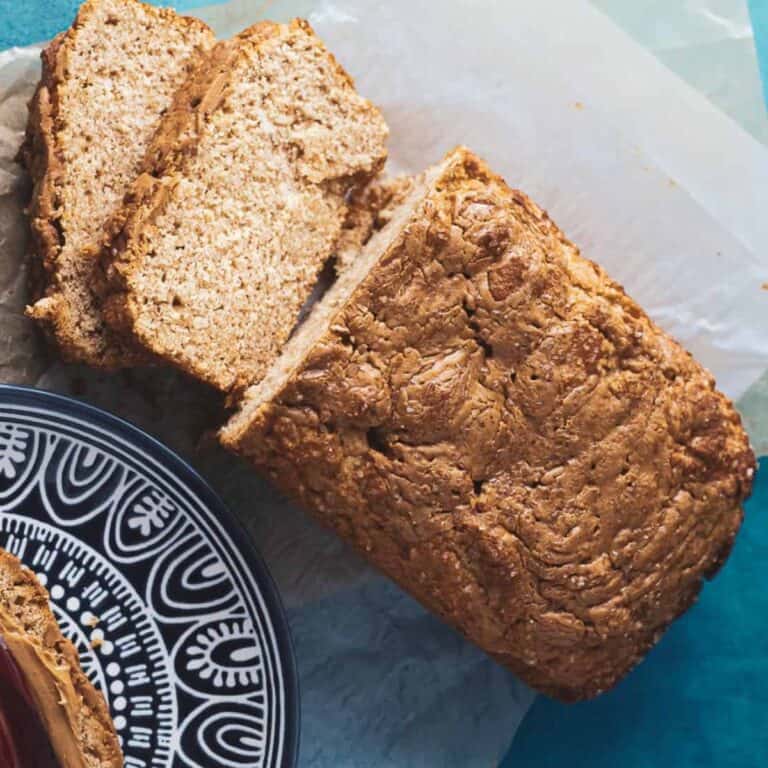 homemade peanut butter bread loaf with two slices taken out of the bread