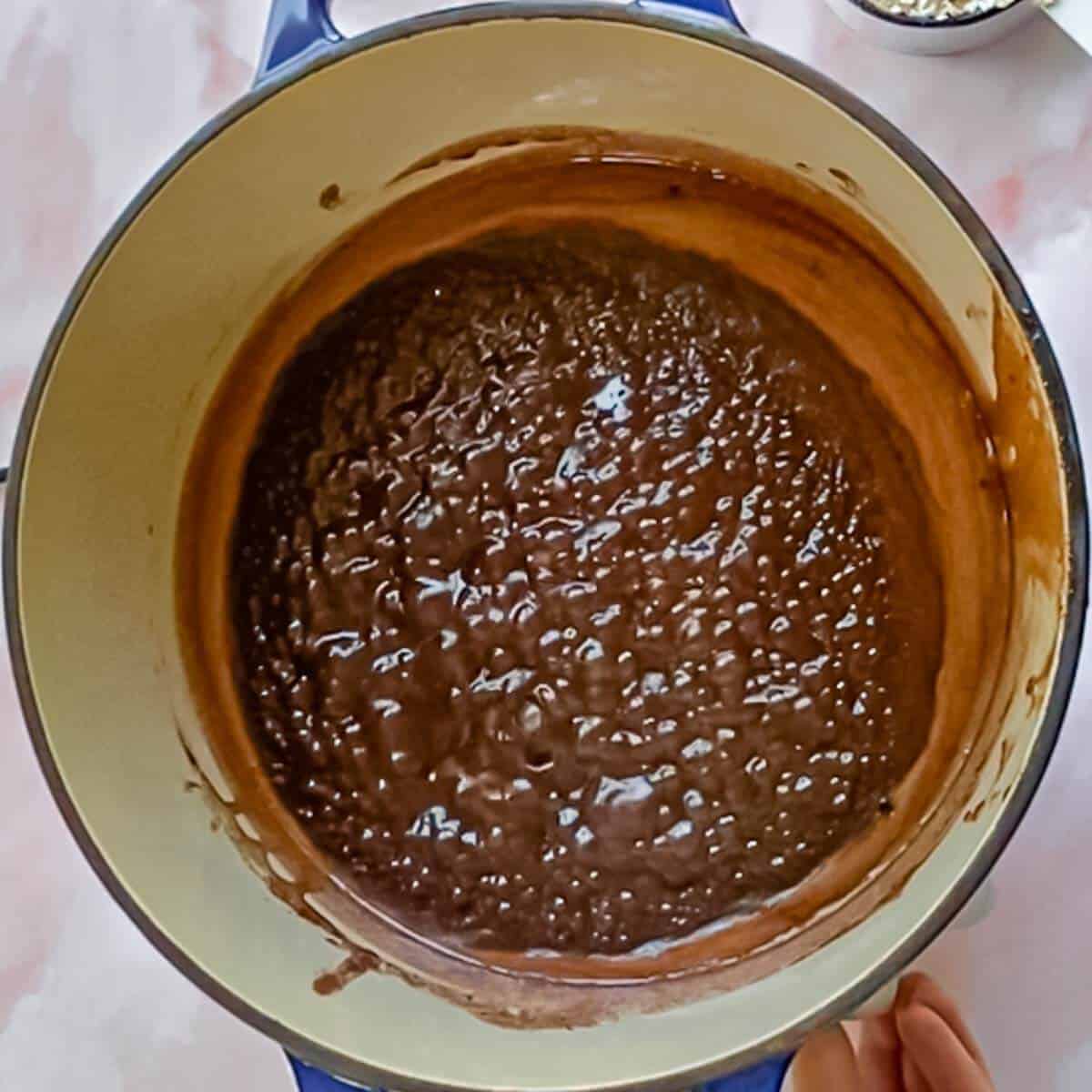 The mixture bubbling as it reaches the correct temperature.