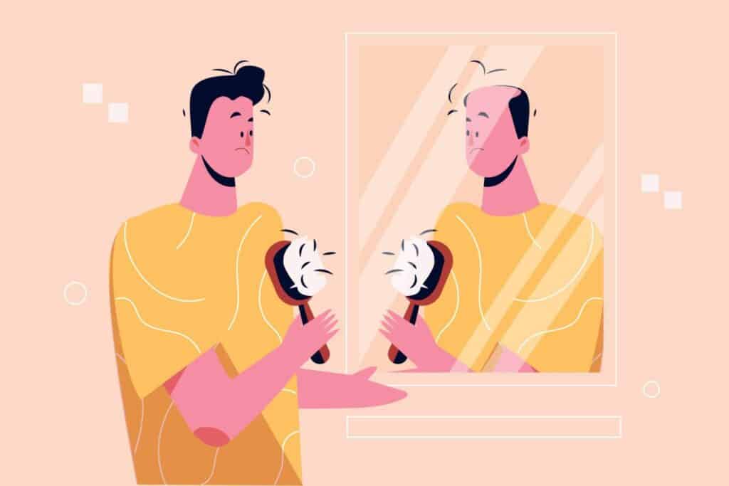 Man looking at his hair transplant results in the mirror, showcasing success.