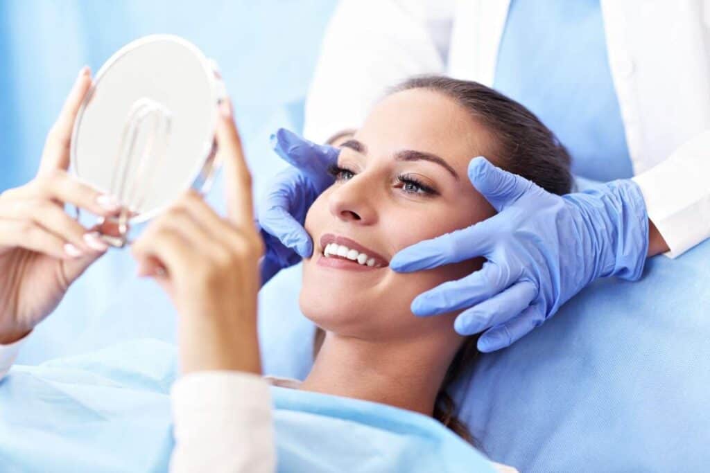 Woman receiving dental treatment in Albania, affordable dental tourism destination.