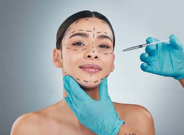 Woman receiving cosmetic injection, plastic surgery in Albania, medical tourism.