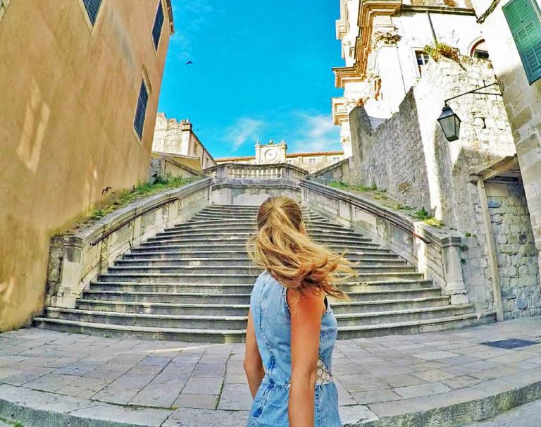 Inside the Old City of Dubrovnik looking up stone stairs