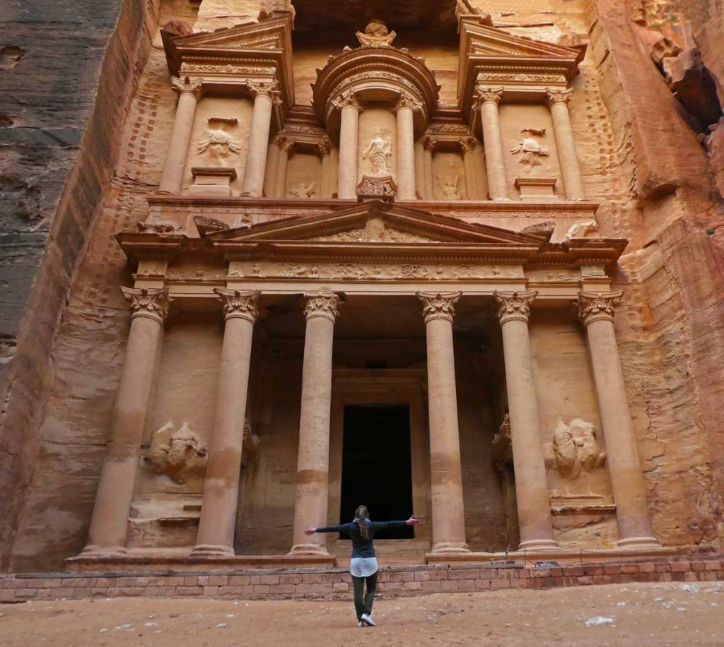 Me standing in front of the Treasury at Petra Archeological Park in the early morning.
