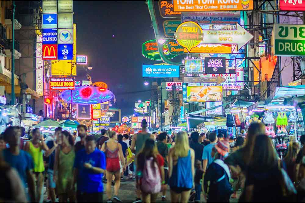 Is Bangkok Worth Visiting? 16 Great Reasons to Visit Bangkok 10 Vibrant night markets and shops at Khao San Road, bustling with people