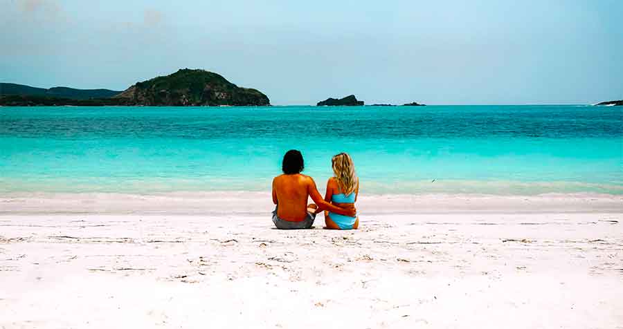 33 Best Hidden Coves and Secluded Beaches Around the World 16 From above, the Caramoan Islands in the Philippines unveil their beauty: powdery sands, crystal-clear turquoise waters, and clusters of lush islands covered in trees