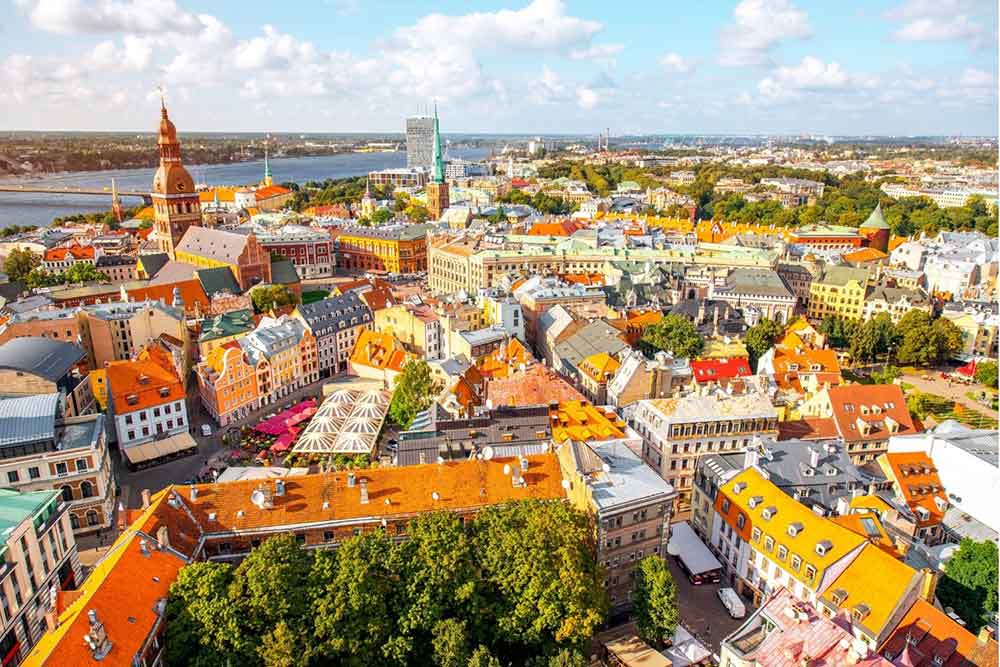 Best Riga 3 Days Itinerary: Exploring ‘Paris of the North’ 12 Cityscape view of Riga looking out over the old town withthe river in the background.