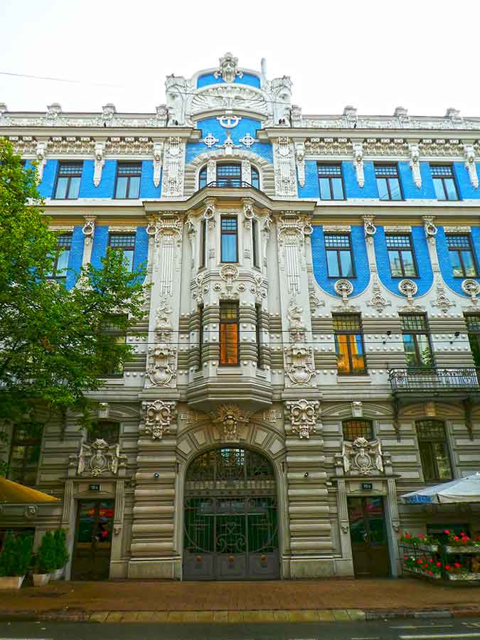 Where to See Art Nouveau in Riga, Latvia: Exploring The Art Nouveau District, Riga 12 Apartment building, Elizabetes Street 10b with its multiple carving arts scattered on the wall of the building