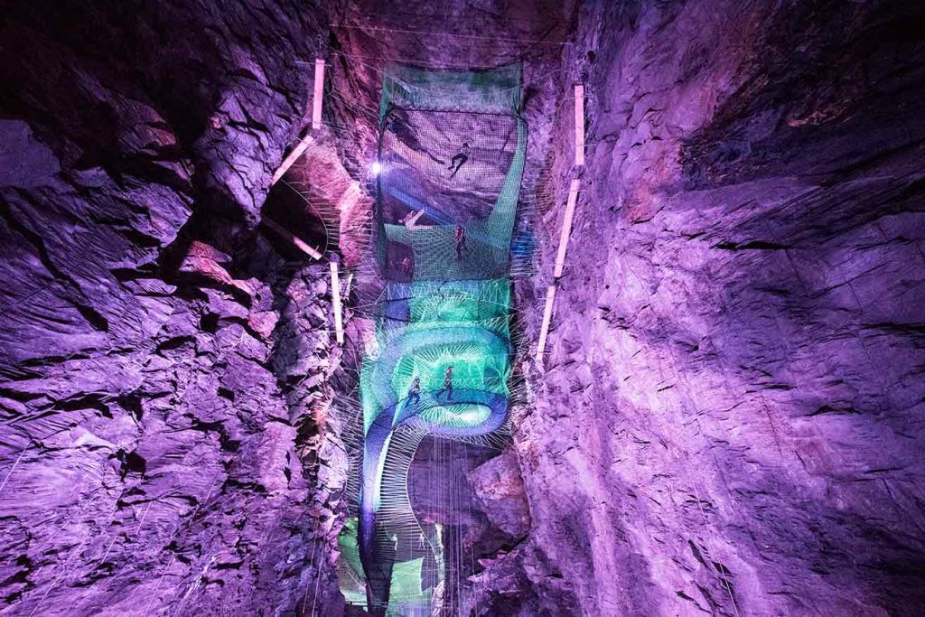 Extreme Adventures in Europe: 29 Best Adventure Sports in Europe 21 Bounce below in Wales features underground large cave with a series of trampoline nets and tube slides at the middle