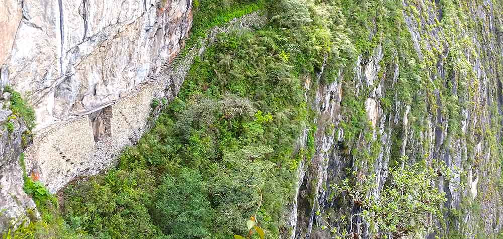 G Adventures Inca Trail Review: What to Expect on The Inca Trail Trek to Machu Picchu 22 The tiny little Inca Bridge perched over the valley below.