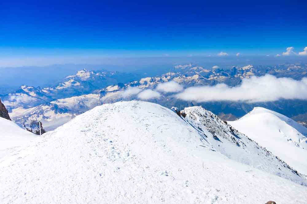 Extreme Adventures in Europe: 29 Best Adventure Sports in Europe 24 Mount Elbrus in Russia covered in a snow and ice offering a stunning view of the mountains and sky