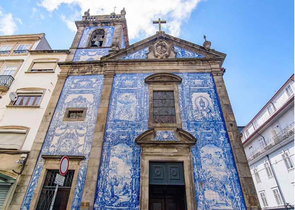 Capela das Almas in Porto - a church with a stunning blue and white tiled facade.