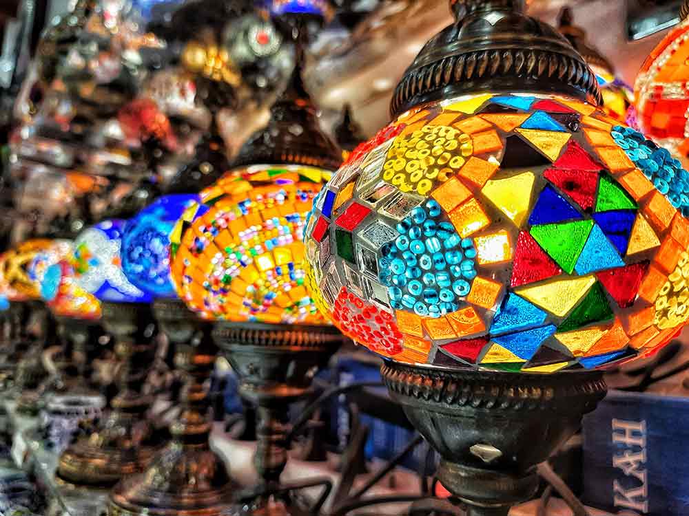 Colorful lanterns displayed in a row at the Alcaiceria Bazaar