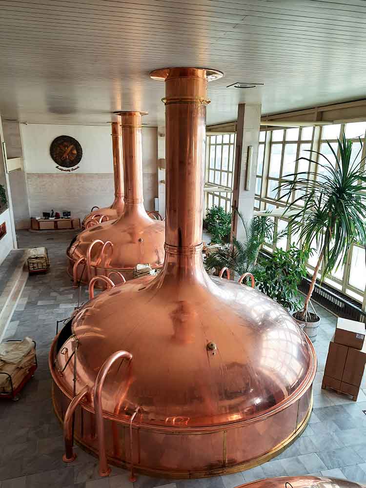 Giant copper boilers at the Budweiser Factory