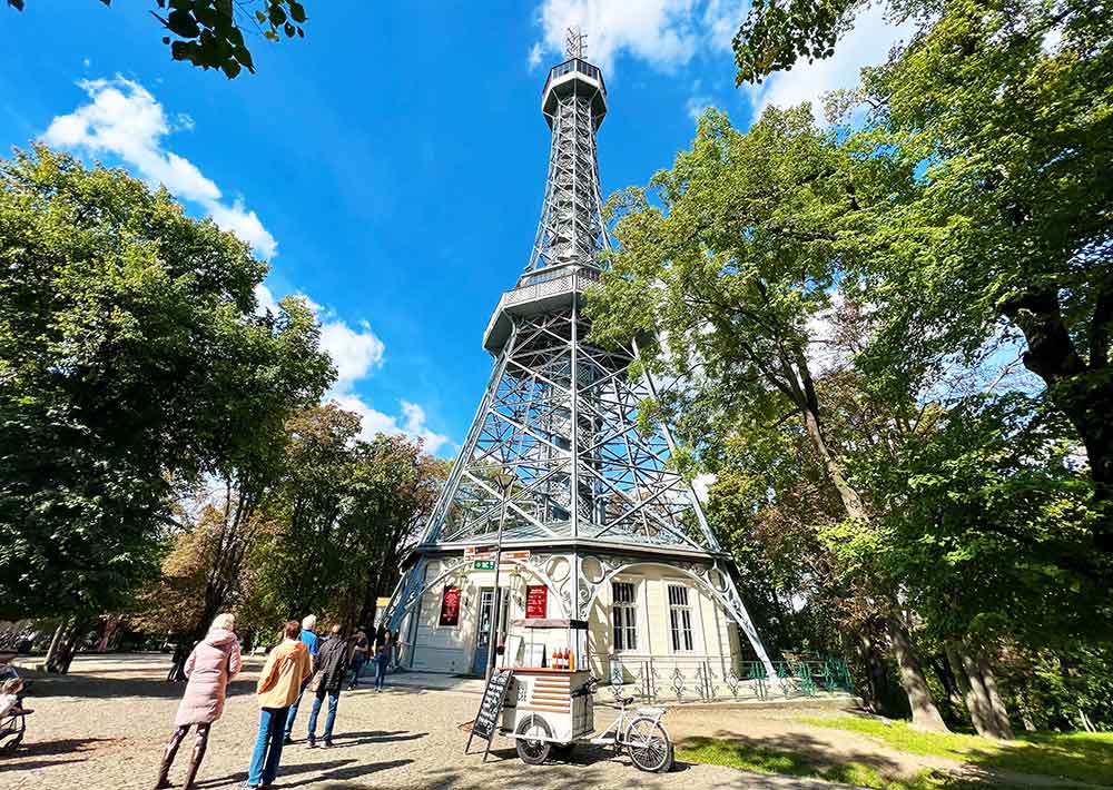 The Pertin tower made of iron and resembles a mini Eiffel tower in a park. 