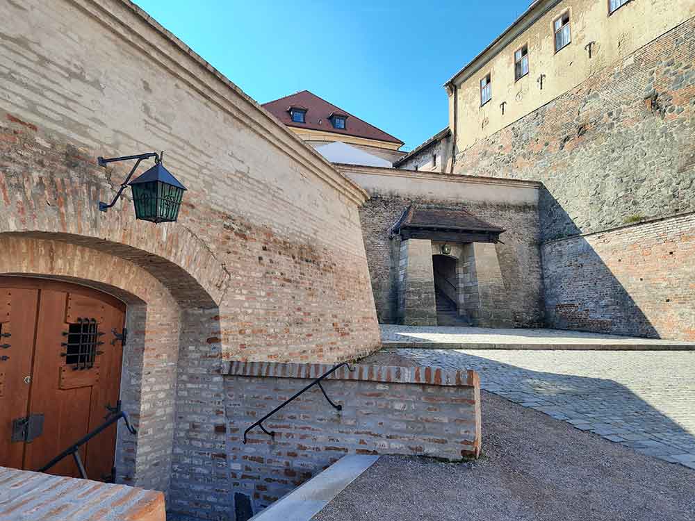 The grounds of Spilberk Castle showing doorways and walls.