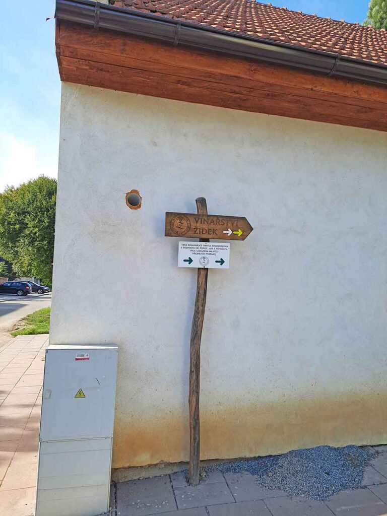 How To Visit 3 Vineyards Near Brno On An Easy Self-Guided Wine Tour, Czech Republic 12 The small sign in Popice village pointing to Zidek winery.