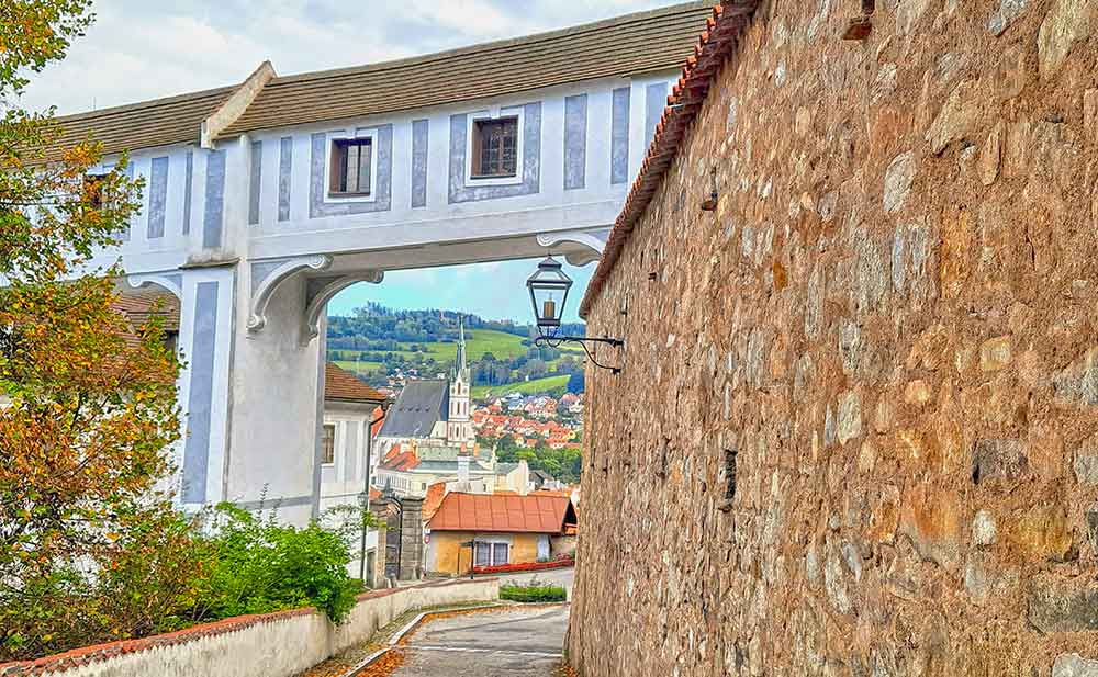 Blue and white archway at Cesky Krumlov looking out to the city. 