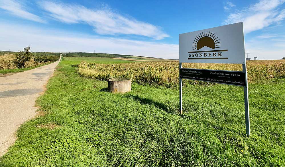 How To Visit 3 Vineyards Near Brno On An Easy Self-Guided Wine Tour, Czech Republic 3 The entrance to Sonberk winery with fields in the background.