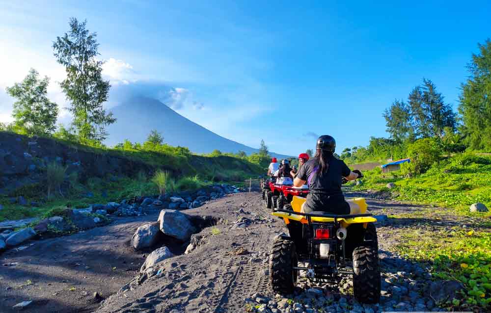 ATV adventure in Mayon Volcano in province of Bicol, Philippines featuring a perfect cone shape