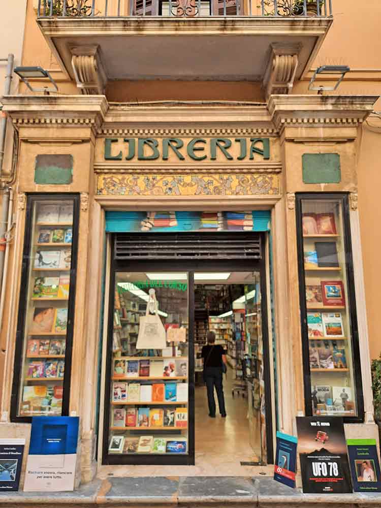 Book shop in Trapani Old Town with decorative signage.