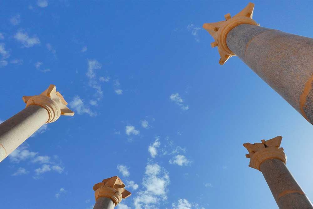 Best 2 Days in Petra Itinerary: Self-Guided Two Days in Petra, Jordan 23 The Blue Chapel in Petra, Jordan with its four tall columns all set under a clear blue sky