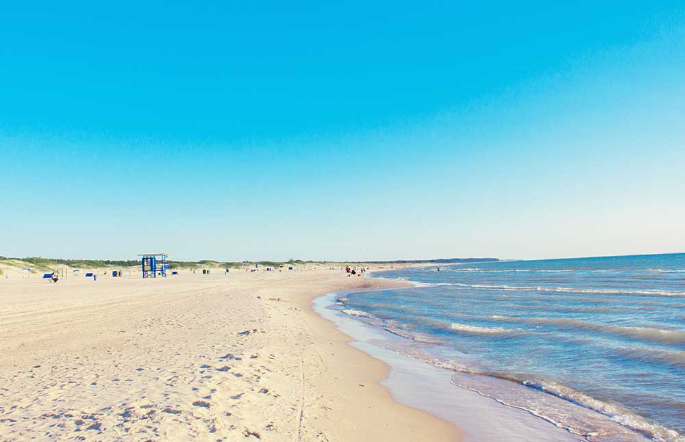 Best Of The Baltics: 23 Unmissable Things To Do In The Baltics 14 Ventspils Beach boasts a long stretch of sandy shoreline and clear water, perfect for swimming and sunbathing