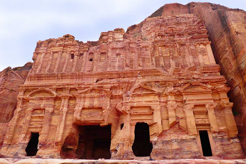 Best 2 Days in Petra Itinerary: Self-Guided Two Days in Petra, Jordan 11 The Palace Tomb in Petra, Jordan, boasts four entrances, each showcasing intricate carved rock structures.