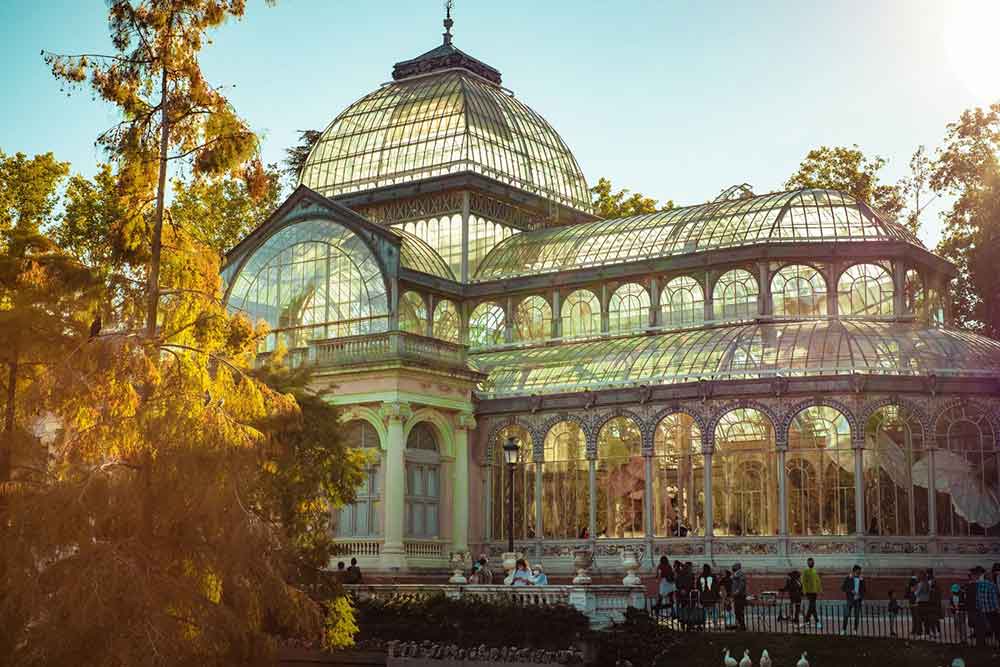 Palacio de Cristal, a magnificent glass palace structured with ironwork frames and tall glass walls