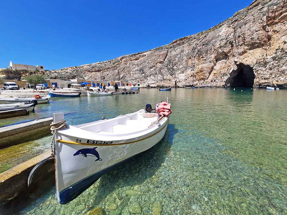 Boats parked at the shore in The Inland Sea, which features a small tunnel or cave