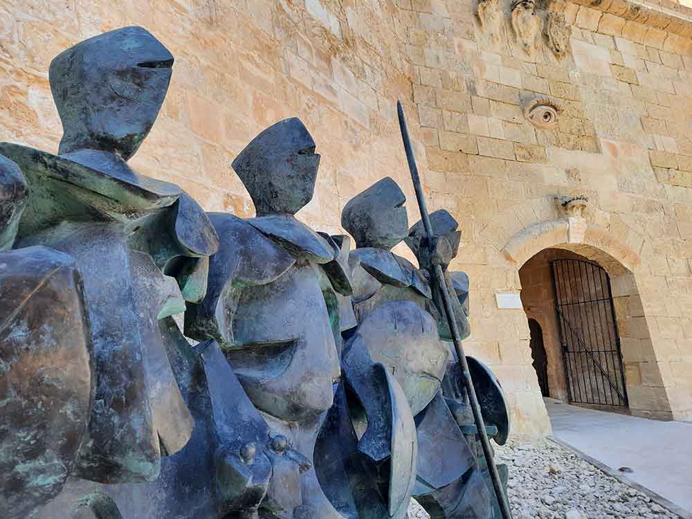 One Week in Malta: The Best 7 Days in Malta Itinerary 7 Four black statues stand beside the entrance of Fort St Elmo