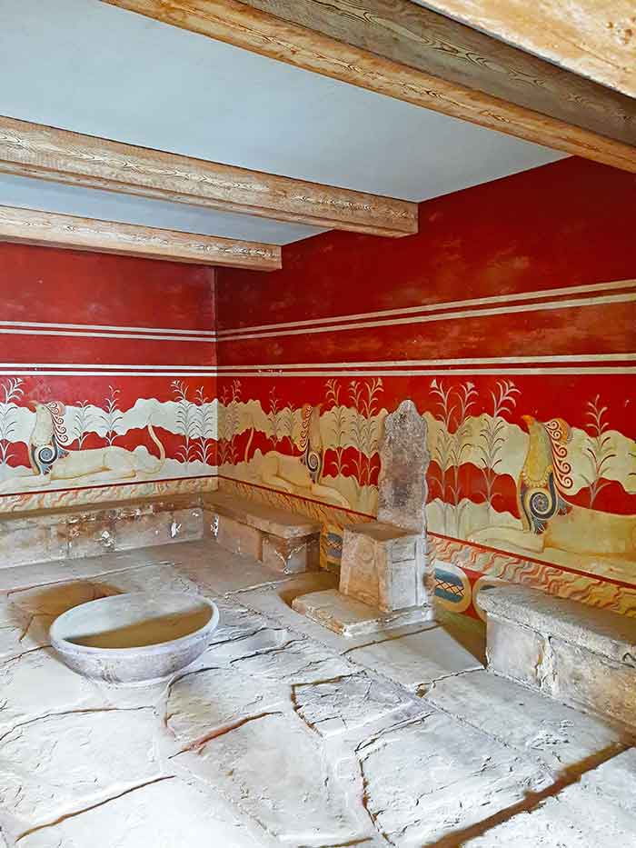The Knossos Throne stands at the middle with a red-painted wall