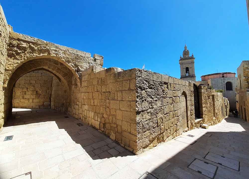 One Week in Malta: The Best 7 Days in Malta Itinerary 27 Ancient Streets of the Citadel in Victoria with a brick walls and blue sky in a background