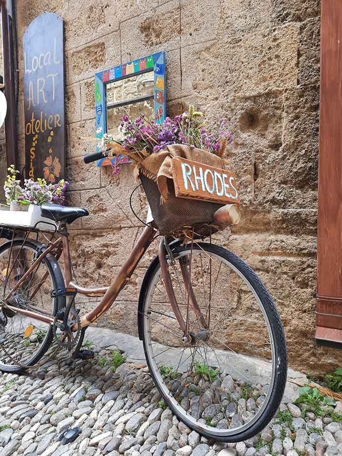 Artisan shops in Rhodes feature bicycles adorned with flowers