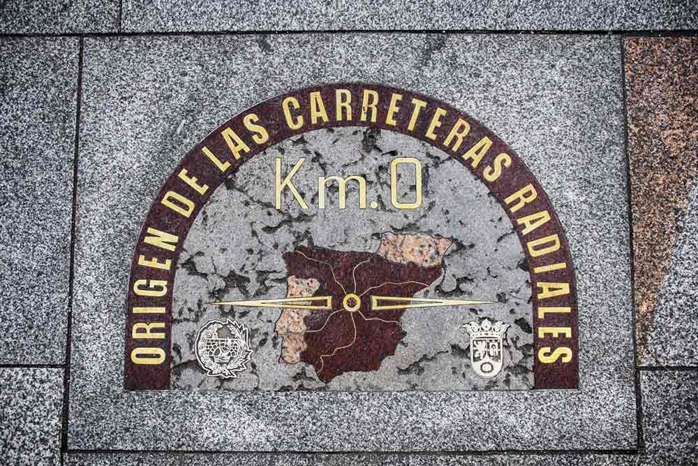 Engraved with the symbol of Kilometre Zero on the pavement in Puerta del Sol Square