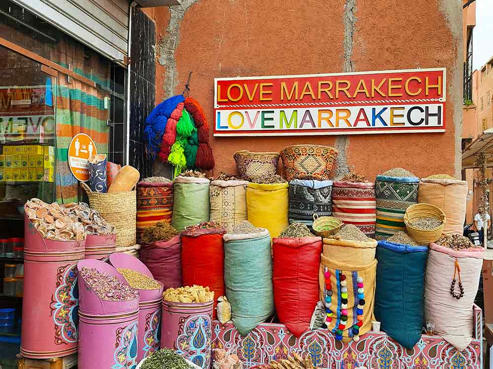 Colourful sacks of spices, tea and other dried good on display at a market in Marrakech.