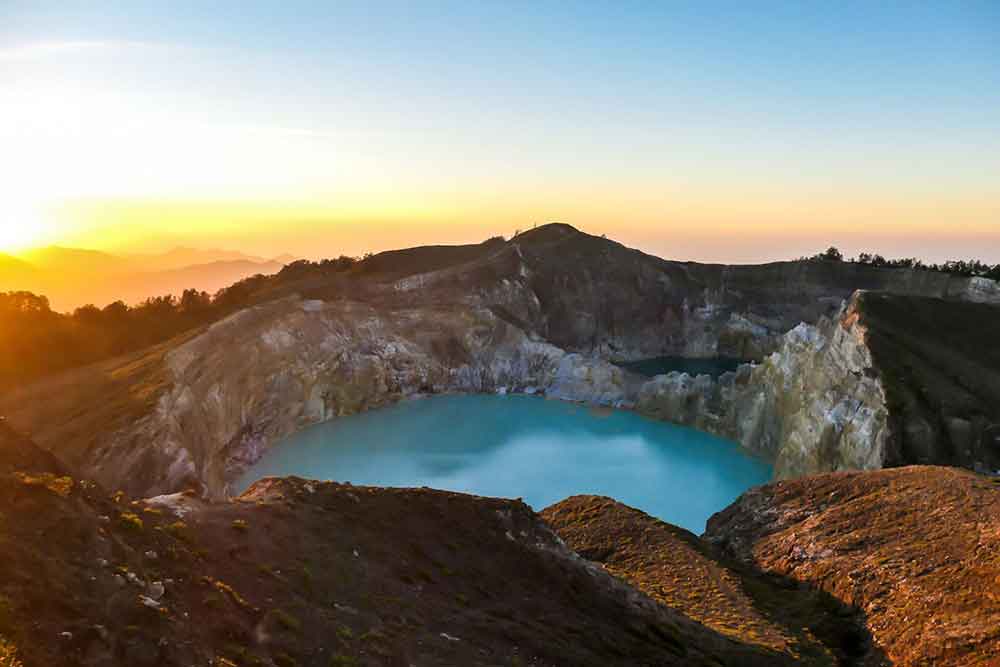 Kelimutu Lakes, Flores captivating turquoise color lake during sunrise