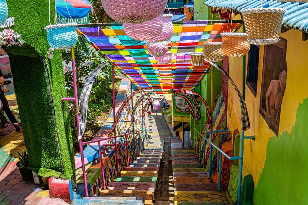 Vibrant colorful rainbow pathway, decorations and walls at Kampung Pelangi, Java