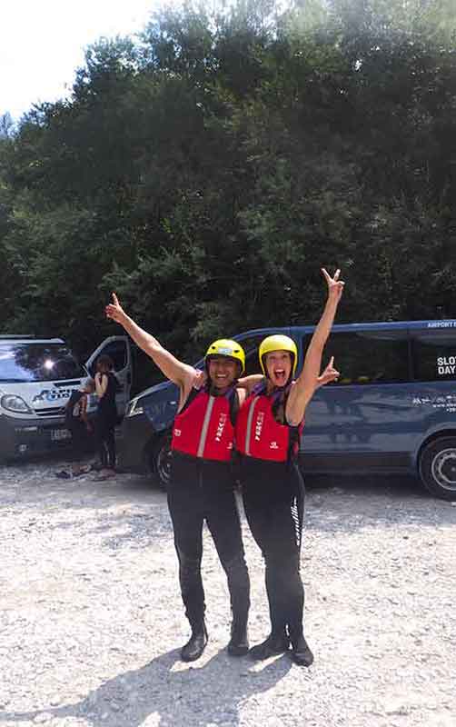 Me taking a picture with my buddy wearing the safety gear before doing the white water rafting activity in Slovenia