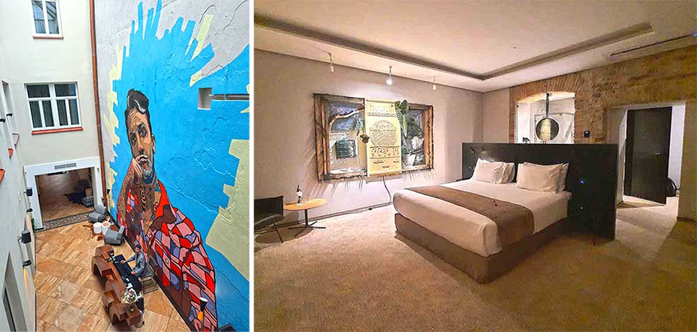 Two images of the Artagonist Hotel in Vilnius - one of the best cities in Lithuania. On the left is a view of the foyer with a large mural of a man behind the reception desk. The image on the right shows the bedroom I stayed in with a bed in the middle of the room, ambient lighting and artwork on the wall. 